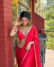 Irresistible Actress Kate Sharma in a Red Saree with Halter Blouse Photos 04