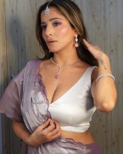 Irresistible Kate Sharma in a Sheer Purple Saree with a White Sleeveless Blouse Photos 02
