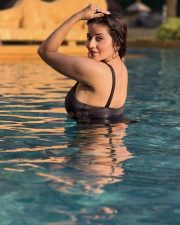 Passionate Antara Biswas Asli Monalisa in a Dark Metallic One Piece Shimmering Swimsuit Photos 01