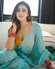 Purushaha Actress Anaira Gupta in a Sky Blue Saree with a Cleavage Contrasting Yellow Blouse Photos 01