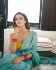 Purushaha Actress Anaira Gupta in a Sky Blue Saree with a Cleavage Contrasting Yellow Blouse Photos 04