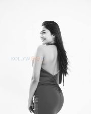 Radiant Payal Radhakrishna Cleavage in a Teal Deep V Halter Ruched Dress Photos 01