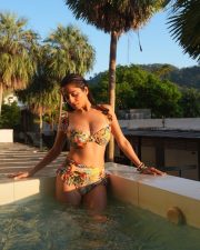 Sensuous Kate Sharma in a Two Piece Yellow High Waisted Bikini with an Orange and Green Tropical Floral Print Photos 01