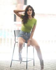 Sexy Anaira Gupta in a Green Top and Denim Shorts Photos 04