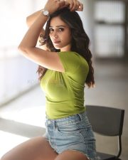Sexy Anaira Gupta in a Green Top and Denim Shorts Photos 08