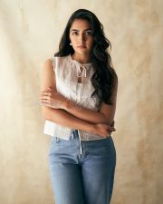 Ace Heroine Rukmini Vasanth in a White Chic Sleeveless Top and Denim Pant Photos 02