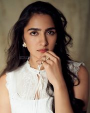 Ace Heroine Rukmini Vasanth in a White Chic Sleeveless Top and Denim Pant Photos 03