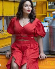 Actress Aanchal Munjal in a V Neck Puff Sleeve Crop Top with a Wrap Around Ruffled Skirt Photos 04