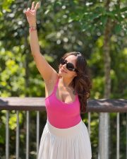 Alluring Aanchal Munjal Cleavage in a Pink Crop Top and White Pleated Mini Skirt Photos 01