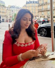 Alluring Aanchal Munjal Cleavage in a Red Jewelled Top Photos 01