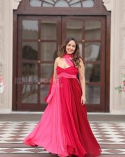Alluring Aanchal Munjal Cleavage in a Red Pink Halter Gown Photos 08
