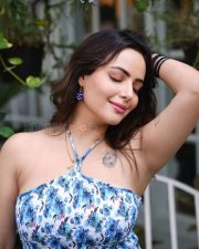 Alluring Actress Aanchal Munjal in a Blue Floral Halter Neck Dress Photos 03