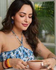 Alluring Actress Aanchal Munjal in a Blue Floral Halter Neck Dress Photos 05