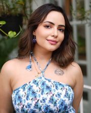 Alluring Actress Aanchal Munjal in a Blue Floral Halter Neck Dress Photos 08