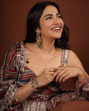 Charming Actress Rukmini Vasanth in a Multi Stripe Printed Cotton Dress Photos 04