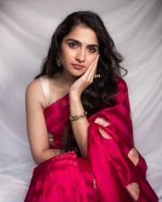 Elegant Rukmini Vasanth in a Red Saree with a Cream Sleeveless Blouse Photos 01