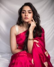 Elegant Rukmini Vasanth in a Red Saree with a Cream Sleeveless Blouse Photos 03