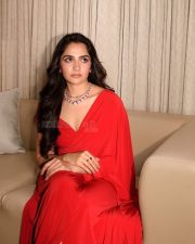 Glamorous Actress Rukmini Vasanth in a Red Off Shoulder Draped Saree Photos 03