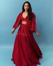Graceful Beauty Rukmini Vasanth in a Red Bralette Lehenga Photos 03