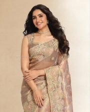 Kantara Chapter 1 Actress Rukmini Vasanth in a Beige Semi Transparent Silk Saree with Sleeveless V Neck Blouse Photos 02