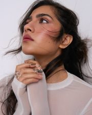 Luminous Actress Rukmini Vasanth in a White Mesh Top Photos 06