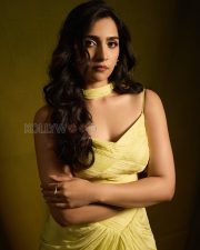Luminous Actress Rukmini Vasanth in a Yellow Pleated Saree with Spaghetti Strap Blouse Photos 01