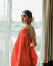Radiant Actress Rukhmini Vasanth in a Orange Silk Saree Photos 07