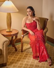 Radiant Actress Rukmini Vasanth in a Red Sequin Strapless Saree Photos 01