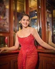 Radiant Actress Rukmini Vasanth in a Red Sequin Strapless Saree Photos 03