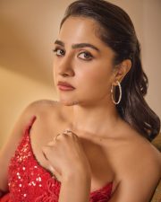 Radiant Actress Rukmini Vasanth in a Red Sequin Strapless Saree Photos 05