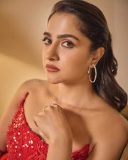 Radiant Actress Rukmini Vasanth in a Red Sequin Strapless Saree Photos 05