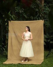 Refined Actress Rukmini Vasanth in a Cream Strapless Tulle Gown Photos 02