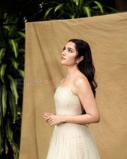 Refined Actress Rukmini Vasanth in a Cream Strapless Tulle Gown Photos 03
