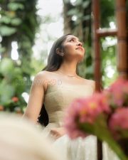 Refined Actress Rukmini Vasanth in a Cream Strapless Tulle Gown Photos 05