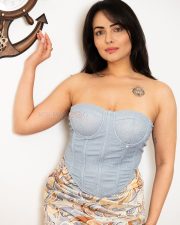 Seductive Aanchal Munjal in a Light Blue Strapless Corset Bustier Top with a Printed Mini Wrap Skirt Pictures 04