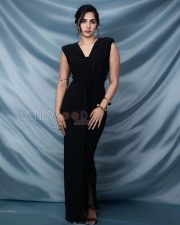 Sophisticated Actress Rukmini Vasanth in a Black Sleeveless Bow Dress Photos 02