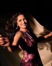 Sophisticated Actress Rukmini Vasanth in a Purple Floral Abstract Gown Photos 04