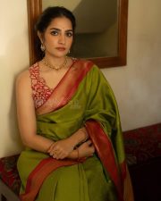 Toxic Actress Rukmini Vasanth in a Traditional Olive Green Kanchipuram Silk Saree with a Sleeveless Red Blouse Photos 04 Toxic Actress Rukmini Vasanth in a Traditional Olive Green Kanchipuram Silk Saree with a Sleeveless Red Blouse Photos 04