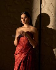 Toxic Heroine Rukmini Vasanth in a Red Strapless Corset Bodice Dress Pictures 03