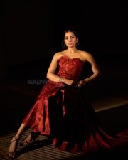 Toxic Heroine Rukmini Vasanth in a Red Strapless Corset Bodice Dress Pictures 05
