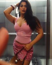 Alluring Actress Nikita Sharma in a Pink Ribbed Tank Top Sequin Mini Skirt Photos 01