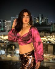 Attractive Nikita Sharma in a Magenta and Pink Floral Printed Crop Top with Puff Sleeves and High Waisted Black Maxi Skirt Pictures 03