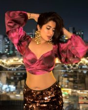 Attractive Nikita Sharma in a Magenta and Pink Floral Printed Crop Top with Puff Sleeves and High Waisted Black Maxi Skirt Pictures 04