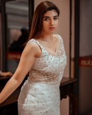 Baby and Baby Actress Pragya Nagra in a White Sheer Saree with Matching White Sleeveless Blouse Pictures 02