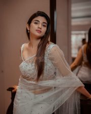 Baby and Baby Actress Pragya Nagra in a White Sheer Saree with Matching White Sleeveless Blouse Pictures 03