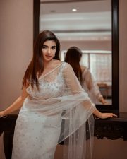 Baby and Baby Actress Pragya Nagra in a White Sheer Saree with Matching White Sleeveless Blouse Pictures 04