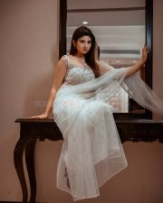Baby and Baby Actress Pragya Nagra in a White Sheer Saree with Matching White Sleeveless Blouse Pictures 05