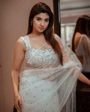 Baby and Baby Actress Pragya Nagra in a White Sheer Saree with Matching White Sleeveless Blouse Pictures 06