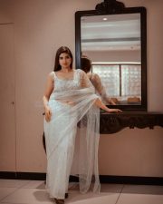Baby and Baby Actress Pragya Nagra in a White Sheer Saree with Matching White Sleeveless Blouse Pictures 08