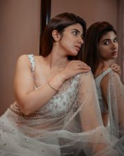 Baby and Baby Actress Pragya Nagra in a White Sheer Saree with Matching White Sleeveless Blouse Pictures 09